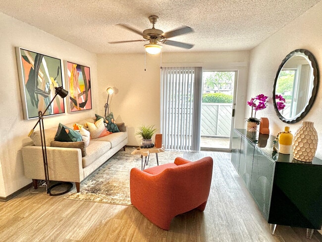 Vibrant Living Room at Sandstone Apartments - Sandstone Apartments