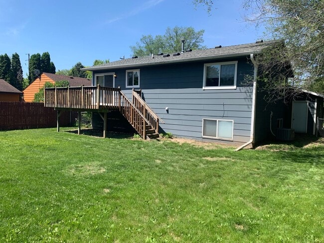 Photo - NE House for Rent 4 bedroom 2 full bathroom fenced in yard 2 Car attached garage.