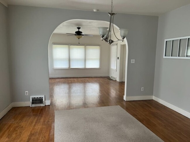 Photo - Charming 3-Bedroom, 1.5-Bath Single-Family Home with Bonus Living Space