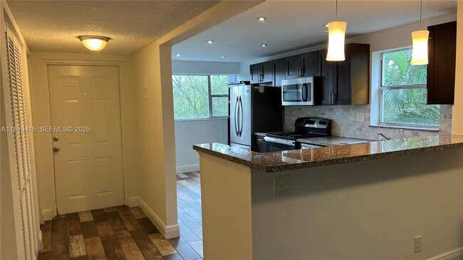 Photo - 8300 Sands Point Blvd Unit K301