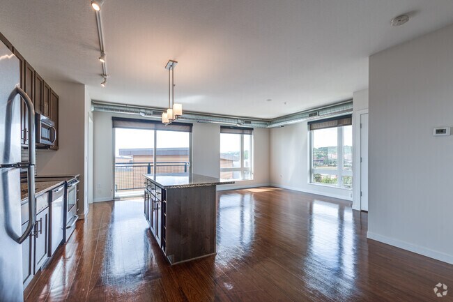 2BR, 2BA - 1,153SF - Kitchen and Living Room - Bluestone Flats