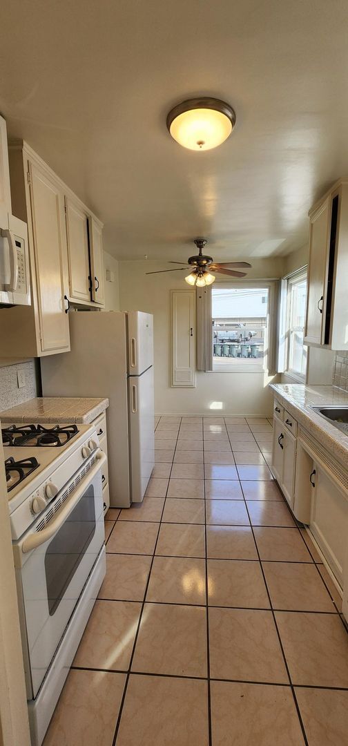 Photo - Recently Reduced!*New Year's Special!!*Vintage duplex near La Mesa Village + basement storage!