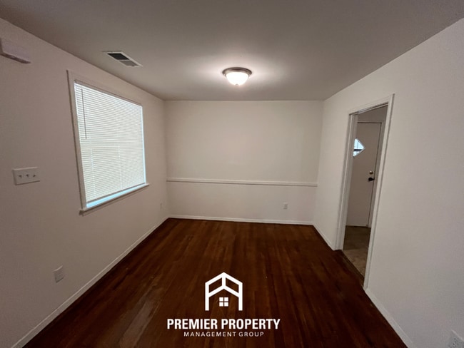Photo - Spacious 3BR/2BA Home with Den & Living Room | Brick Fireplace & Large Yard
