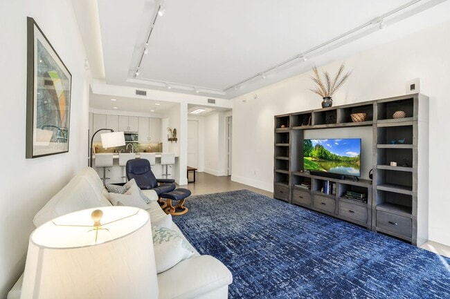Photo - Luxury Living Meets Prime Location! Naples Square 2/2 Condo with Expansive Terrace