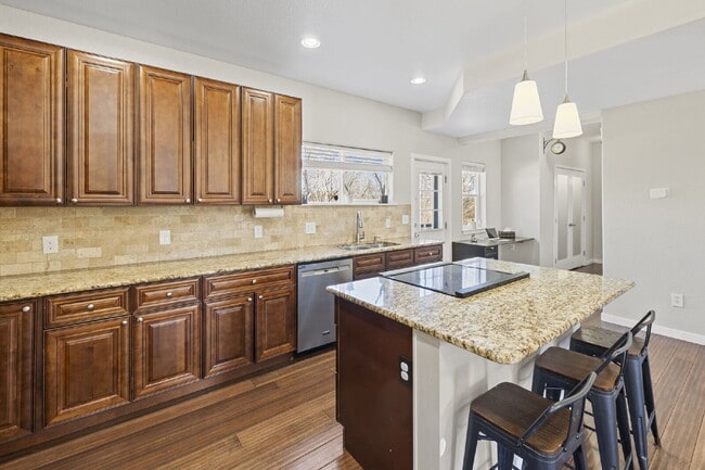 Photo - Spacious Home with Finished Basement, Granite Kitchen & Fenced Yard Near Fort Carson