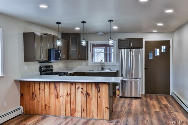 Photo - 21 Center St Unidad Rear