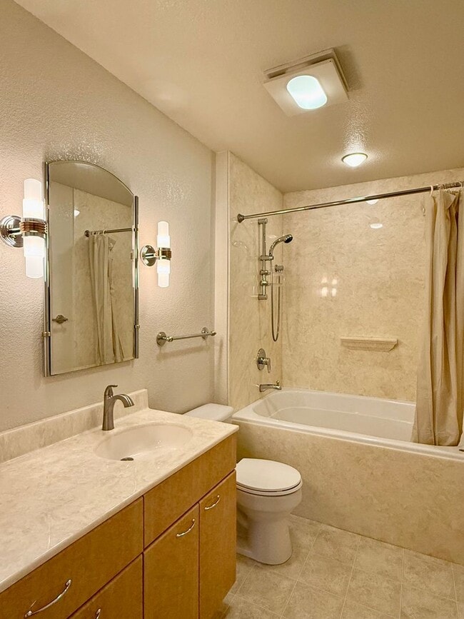 Photo - New Vinyl Plank Flooring, Fresh Interior Paint, 1 Car Garage + 1 Assigned Outdoor Parking Space -...