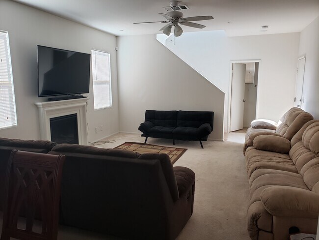 Living Room with reclining couches - 3560 Mount Whitney Ave