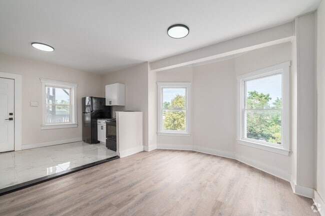 3 habitaciones, 1 baño - 969 pies cuadrados - Sala de estar - Royal Midtown