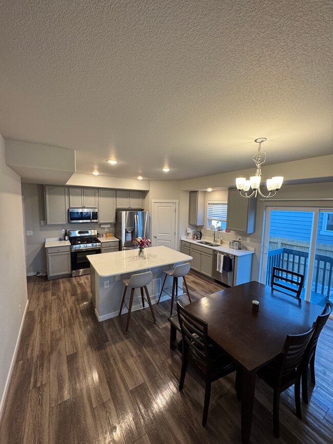 Shared Kitchen - 7718 Sun Shimmer Vw Unit Private Basement Suite