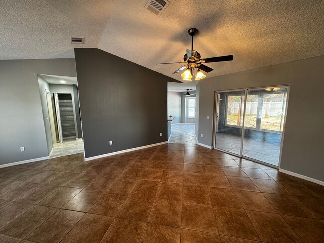 Photo - Beautifully Maintained 3BR/2BA Home with Fenced Yard & Sunroom in Ocala