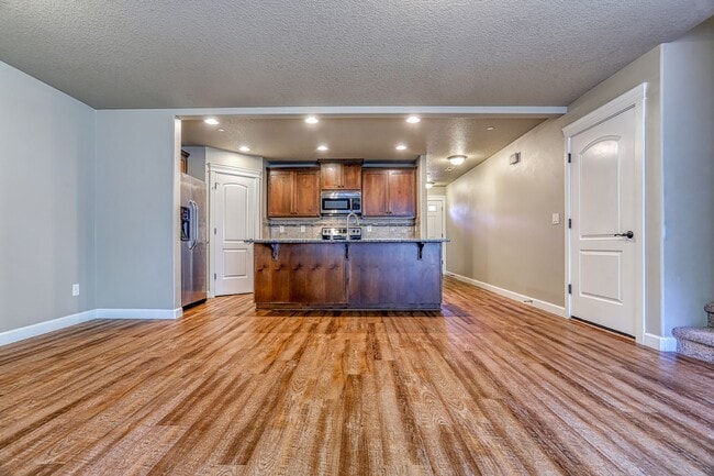 Photo - Centrally Located 4 Bedroom Townhome with Attached Garage & AC