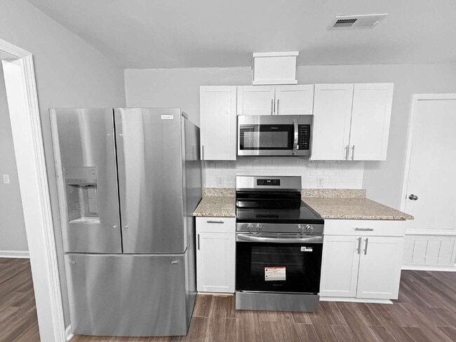 Photo - Luxury Fully Renovated 2-Bedroom with Brand-New Finishes – Minutes from Cordova Mall and NAS Pens...