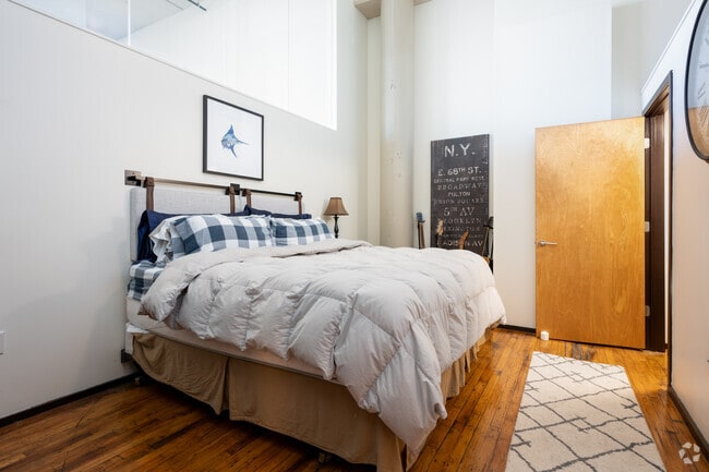 2BR, 2BA - 1097SF - Primary Bedroom - Winston Factory Lofts