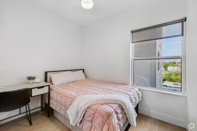 4BR, 2BA - 1,135SF - Primary Bedroom