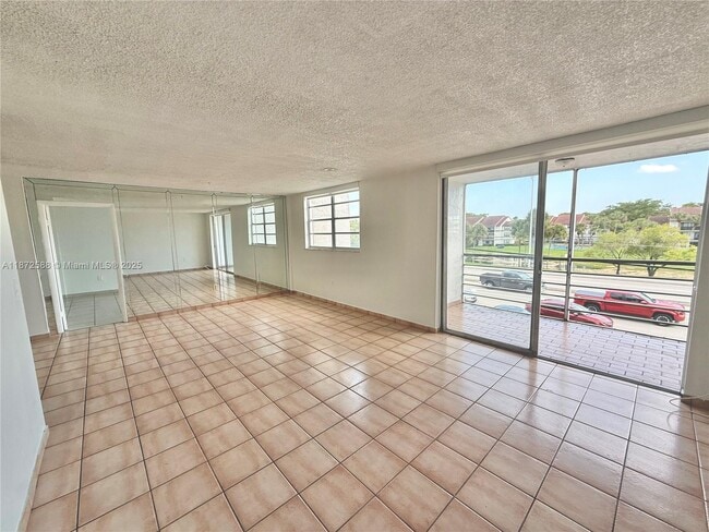 Building Photo - 14155 SW 87th St Unit E-307 Rental