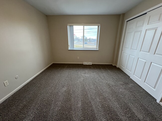 2-Bed Apt: Primary Bedroom - Fairway Apartments