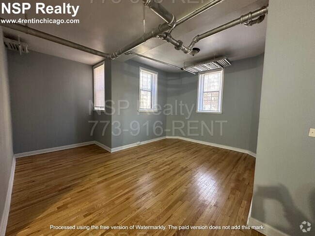 Building Photo - 1369 W Estes Ave Unit X Rental