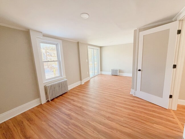 Photo - Modern Renovated 2-Bedroom Single-Family Home with Large Yard and Laundry Hook-Ups