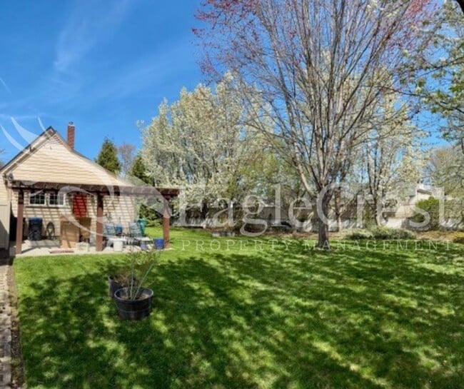 Photo - Charming Two Bedroom House with Bonus Room & Large Fenced Yard