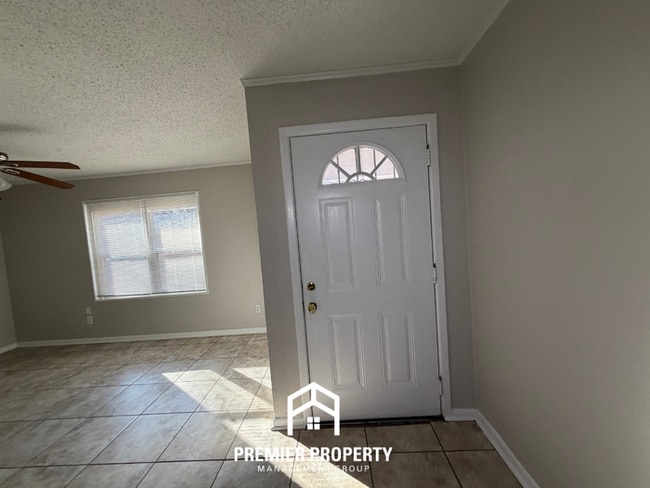 Photo - Charming 3BR Memphis Home with Tile Floors, Dining Area & Fenced Backyard