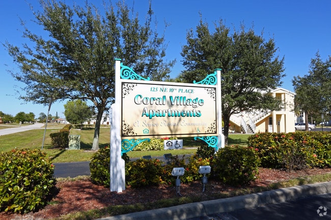 Photo - Coral Village Apartments