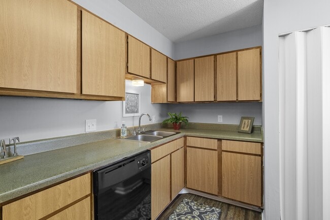 Stylish, functional kitchens designed for everyday living at Lakeland East Apartments in Flowood, MS. Managed by Highlands Vista Group.