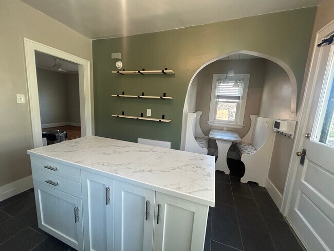 Newly Remodeled Kitchen with Stainless Steel Appliances, Island, Tiled Floors & Breakfast Nook - 4524 Orkney Ave Unit 1