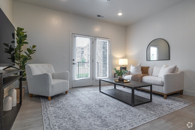 2BR, 2BA - 1,080SF - Living Room - Ridgeline Parkway Apartments