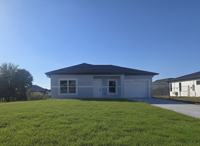 Building Photo - Brand New 2/2/1-PRIME SW LOCATION - Lehigh Acres