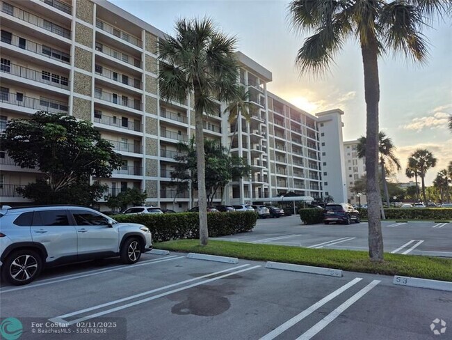 Building Photo - 3150 N Palm Aire Dr Unit 208 Rental