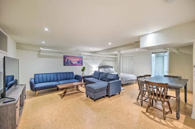 Living area, bed, dining room table - 3301 W Franklin St Unit Garden Studio
