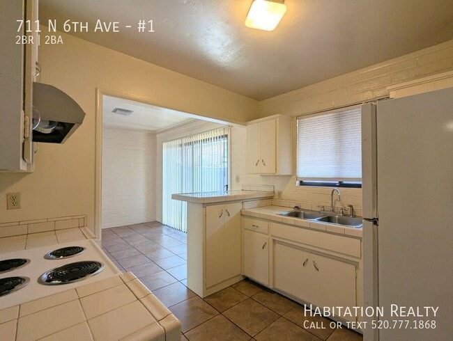 Building Photo - 711 N 6th Ave Unit #1