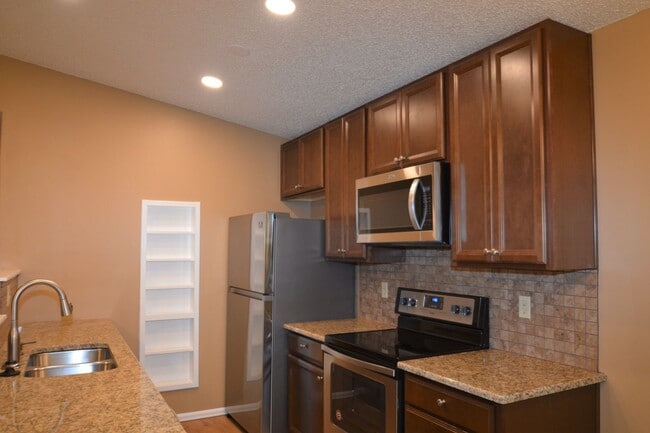 Photo - Townhome - 2 bedrooms, 1 bathroom & 1 car garage - A/C will be installed!! NO PETS ALLOWED!