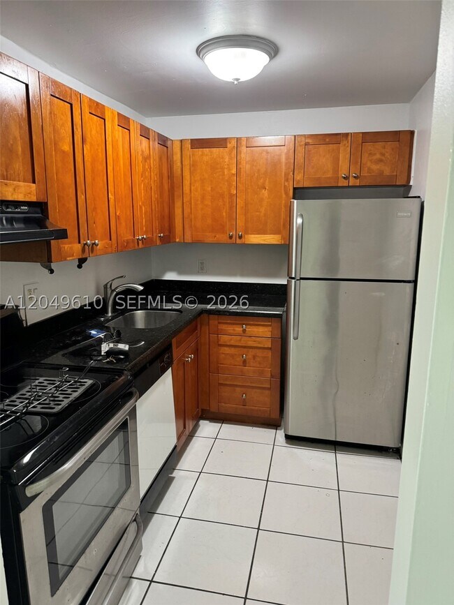 Building Photo - 8511 NW 8th St Unit 303