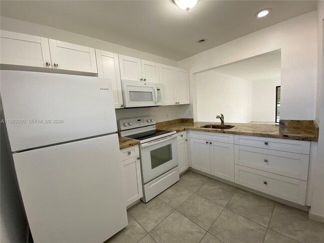 Building Photo - 14925 SW 104th St Unit 3-204