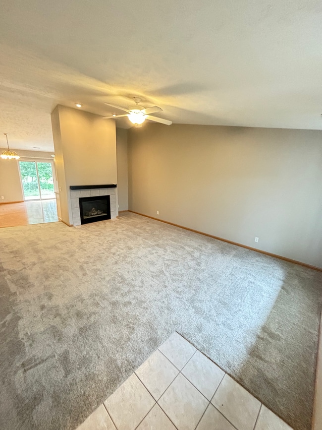 Photo - **$300 Off Move In Special** Spacious 3 Bedroom Townhome with Vaulted Ceilings, Fireplace & Attac...