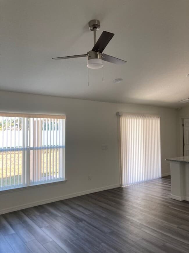 Photo - Like new 3/2/2 with screened in porch! Located close to the beach, shopping, parks and so much mo...