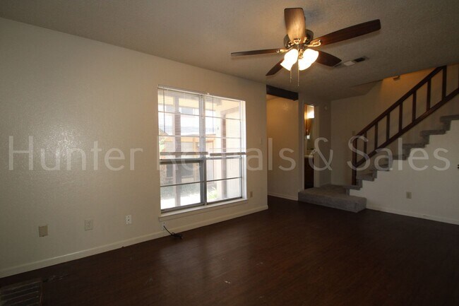 Photo - Charming Two-Bedroom Townhome with Fireplace