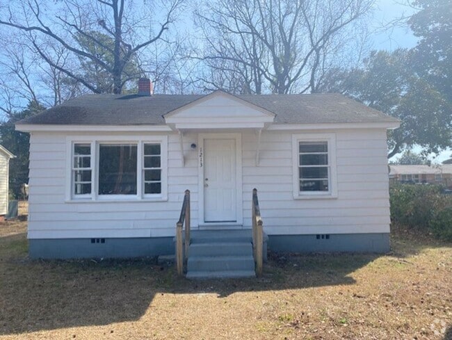 Building Photo - Cute and Cozy Rental