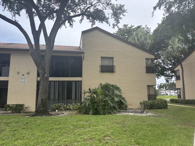 Building Photo - 3751 Cocoplum Cir Unit 3564