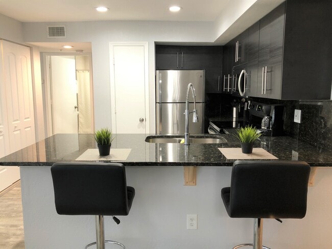 Fully furnished Kitchen - 7220 Westpointe Blvd Unit 1423