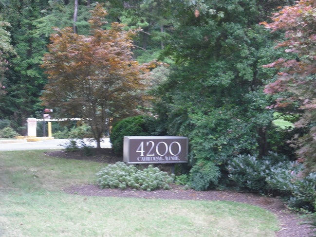 Surrounded by trees. - 4200 Cathedral Ave NW Unit 1108