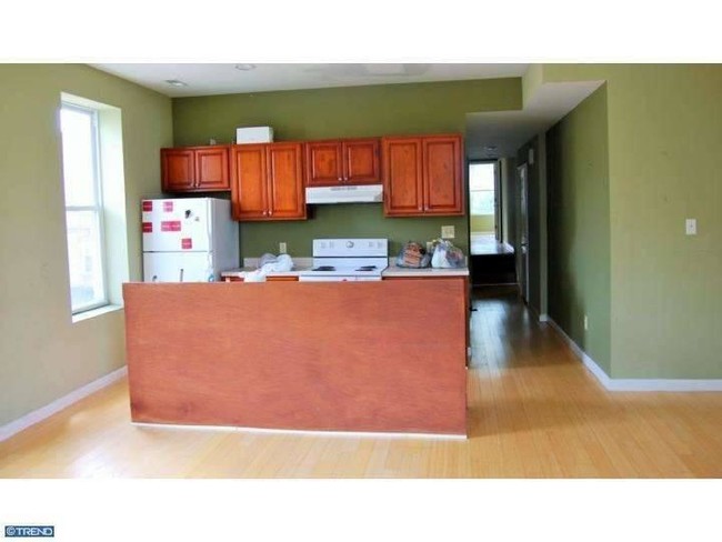 Open kitchen with living room - 1701 Master St Apartments