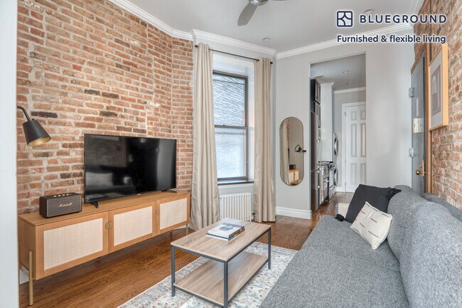 309 E 8th St Unit SI FL1-ID1115