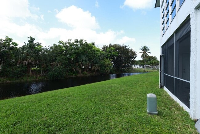 Building Photo - 6570 Royal Palm Blvd Unit 106j