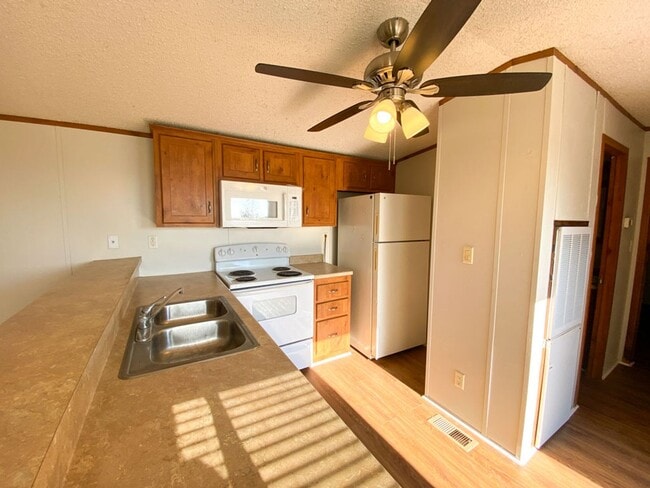 Photo - Country 2 Bedroom 1 Bath with a fenced Yard