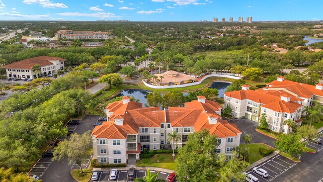 Building Photo - Live the Resort Lifestyle at Tides at Pelican Landing – Furnished 2BR Condo Unit 305