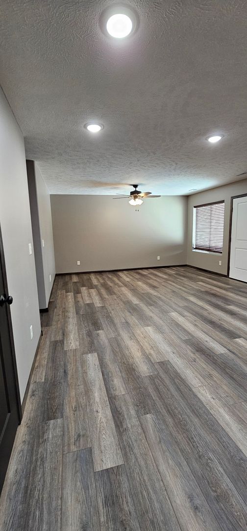 Photo - 2 bedroom, 1 bathroom apartment with 2 car attached garage Unidad Apartment C