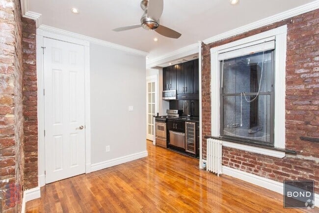 Building Photo - 410 E 13th St Unit 3C Rental